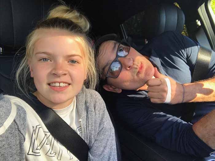 Charlie Sheen and his daughter Lola Sheen taking a selfie.